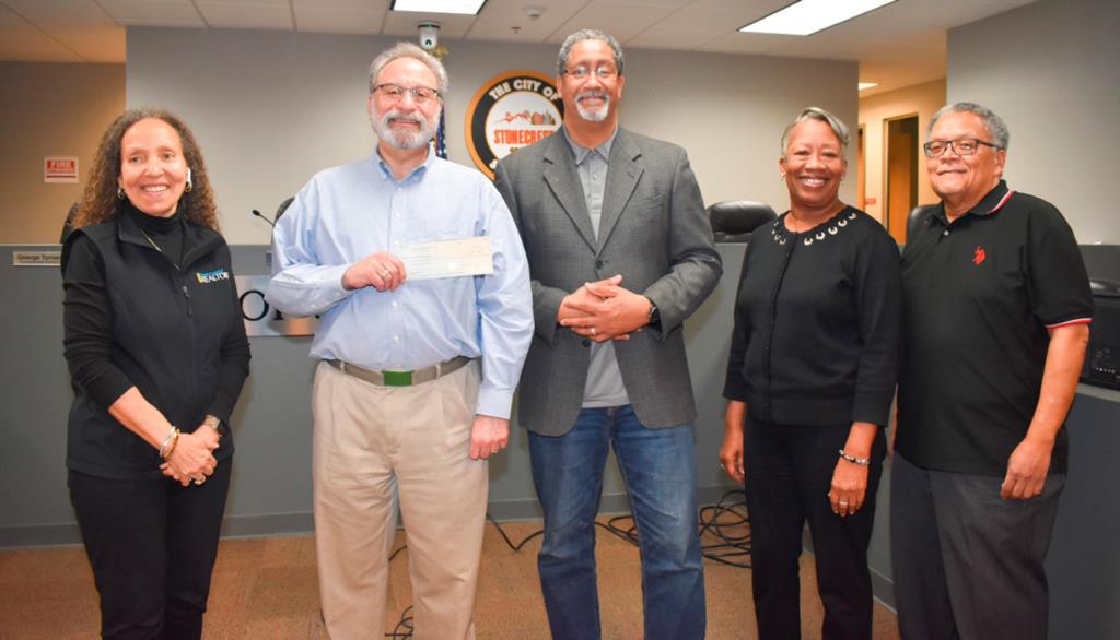 City Receives First Checks for New Developments